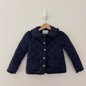 Janie and Jack quilted ruffle collar jacket in the color merchant marine